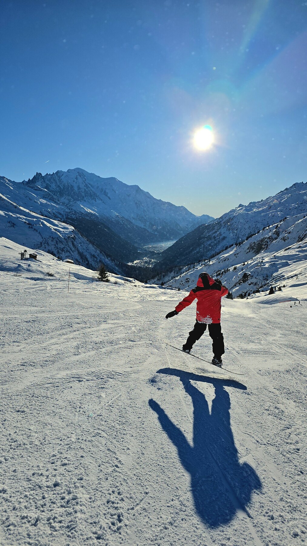 Snowboarding down a mountain run